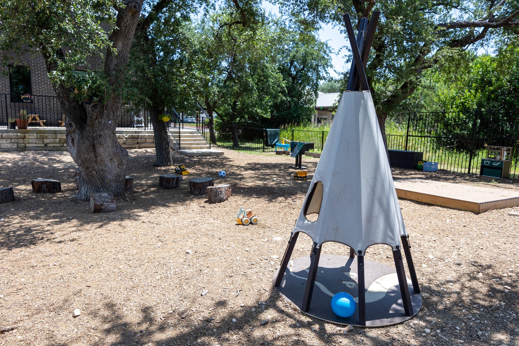Cedar Park outdoor log stumps